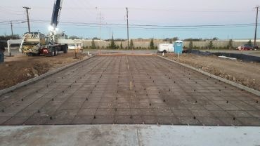 Concrete slab with rebar grid under construction